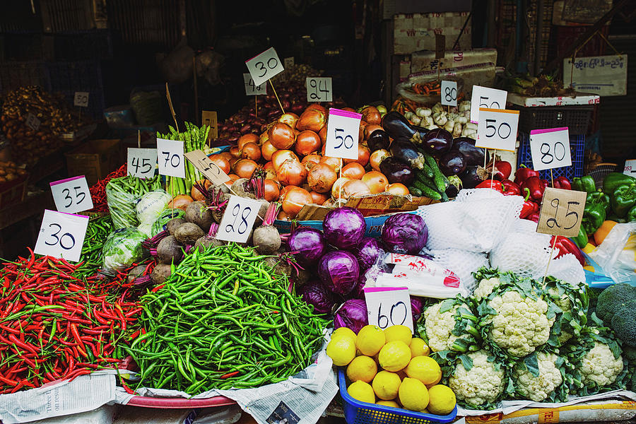 Vegetable Stand At The Khlong Toei Market In Bangkok thailand Photograph by Jan Wischnewski