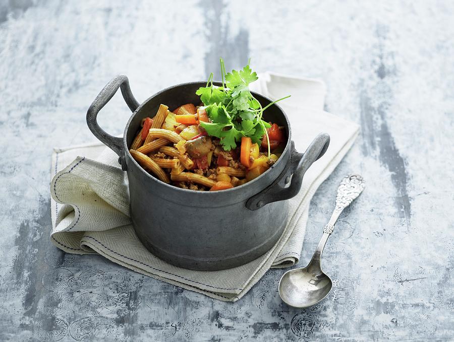 Vegetable Stew With Beef, Mushrooms And Pasta In A Small Pot Photograph by Mikkel Adsbl