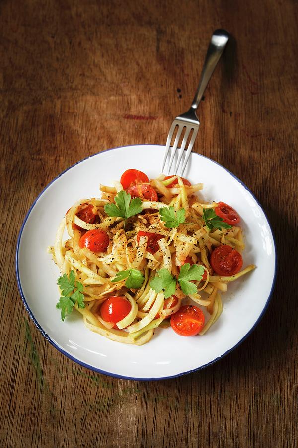 Vegetables Spaghetti Made From Kohlrabi With Steamed Cherry Tomatoes And Garlic Photograph by Eva Grndemann