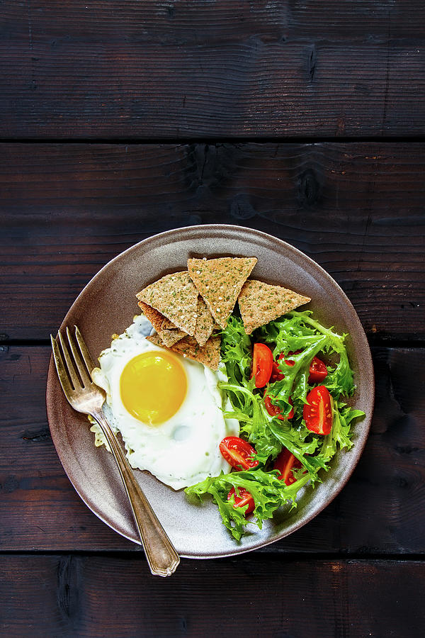 Vegetarian Breakfast With A Fried Egg, Salad And Crackers seen From Above Photograph by Yuliya Gontar