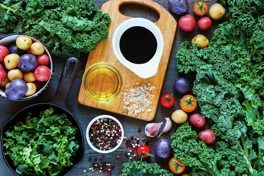Vegetarian Food Background With Old Cutting Board, Cast Iron Skillet And Fresh Colorful Organic Vegetables Photograph by Yuliya Gontar