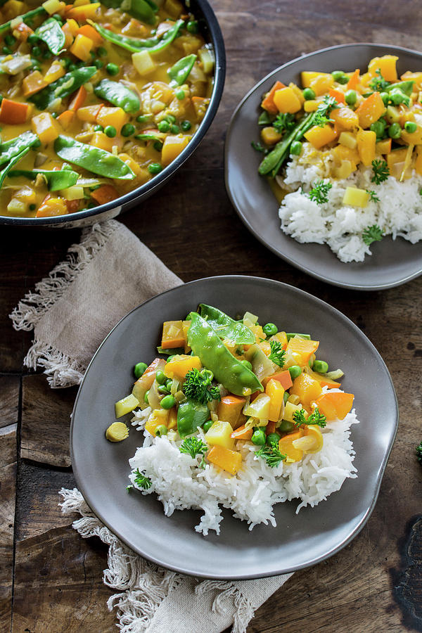 Vegetarian Pumpkin And Pea Curry With Rice Photograph by Lieberbacken