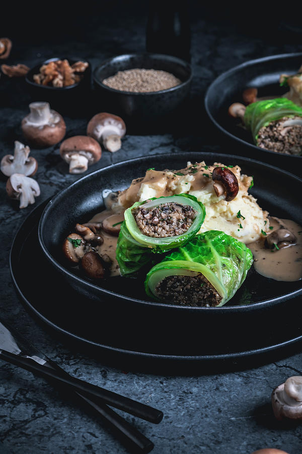 Vegetarian Savoy Cabbage Roulade With A Mushroom And Quinoa Filling Photograph by Christian Kutschka