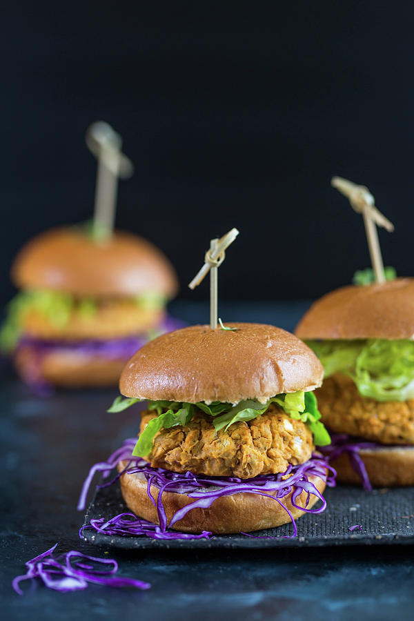 Veggie Burgers With Butterbean Patties, Red Cabbage And Lettuce Photograph by Aniko Takacs
