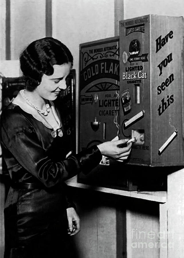 Vending Machine Dispensing Lit Cigarettes for a Penny - 1931 by Doc Braham Vending Machine Dispensing Lit Cigarettes for a Penny - 1931 by Doc Braham