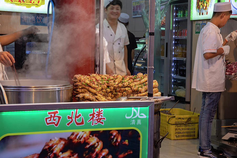 Vendors selling street food, muslim neighborhood street market a Photograph by Karen Foley
