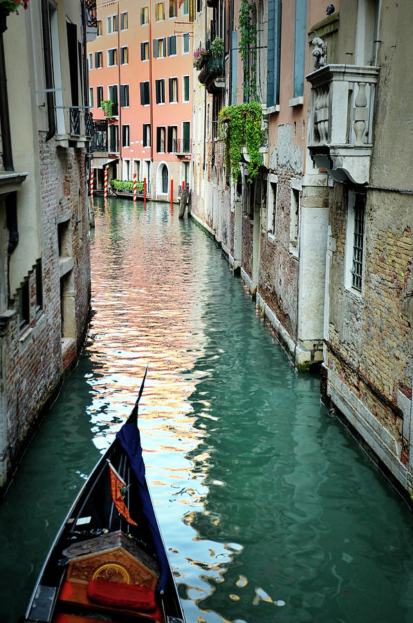 Venetian Canal And Gondola Photograph by Trigga