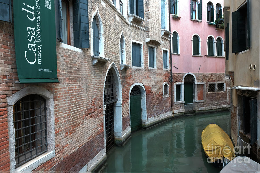 Venetian streets -canals. Carlo Galdoni Museum Photograph by Marina Usmanskaya