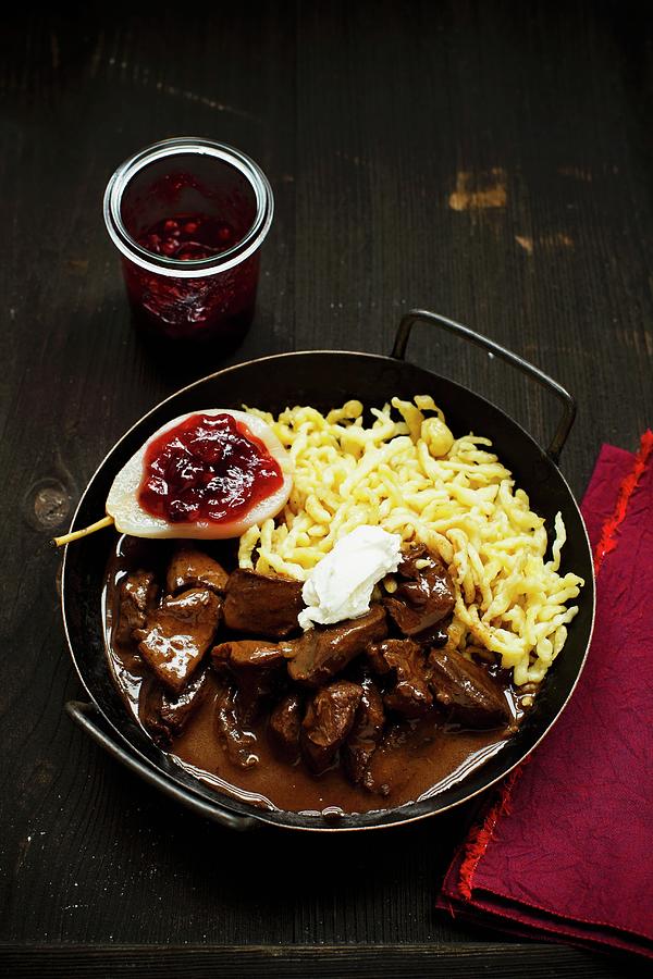 Venison Ragout With Sptzle soft Egg Noodles From Swabia And A Lingonberry Pear Photograph by Sporrer/skowronek