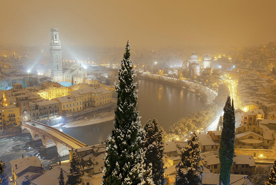 Verona By Night Under The Snow In Winter Photograph by Moreiso