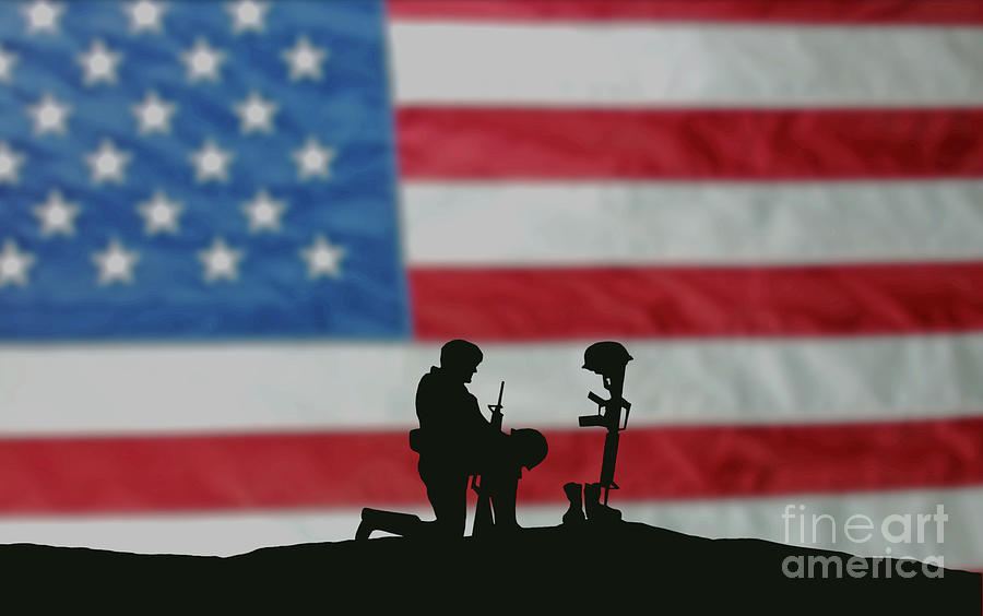 soldier kneeling at grave silhouette