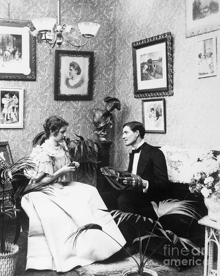 Victorian Couple Alone Knitting Photograph by Bettmann