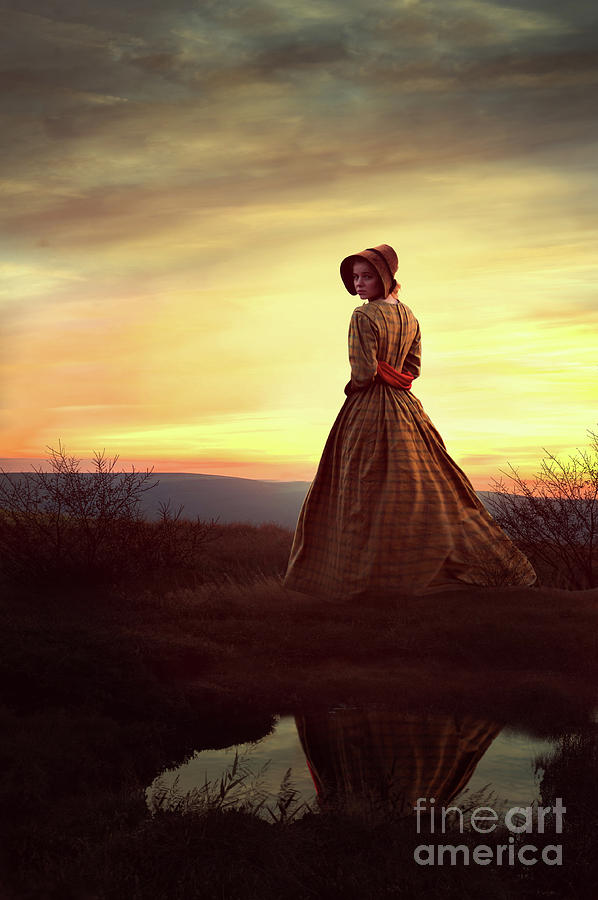 Victorian Woman In Silhouette Against Sunset Photograph by Lee Avison