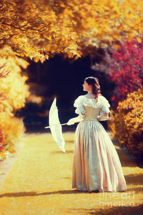 Victorian Woman Walking In An Autumn Garden  Photograph by Lee Avison