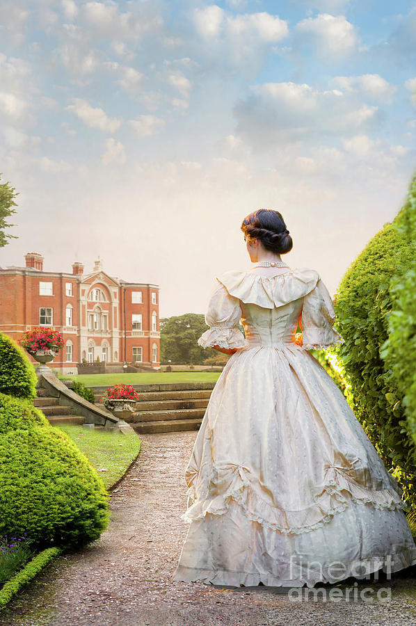 Victorian Woman Walking Towards A Mansion Photograph by Lee Avison