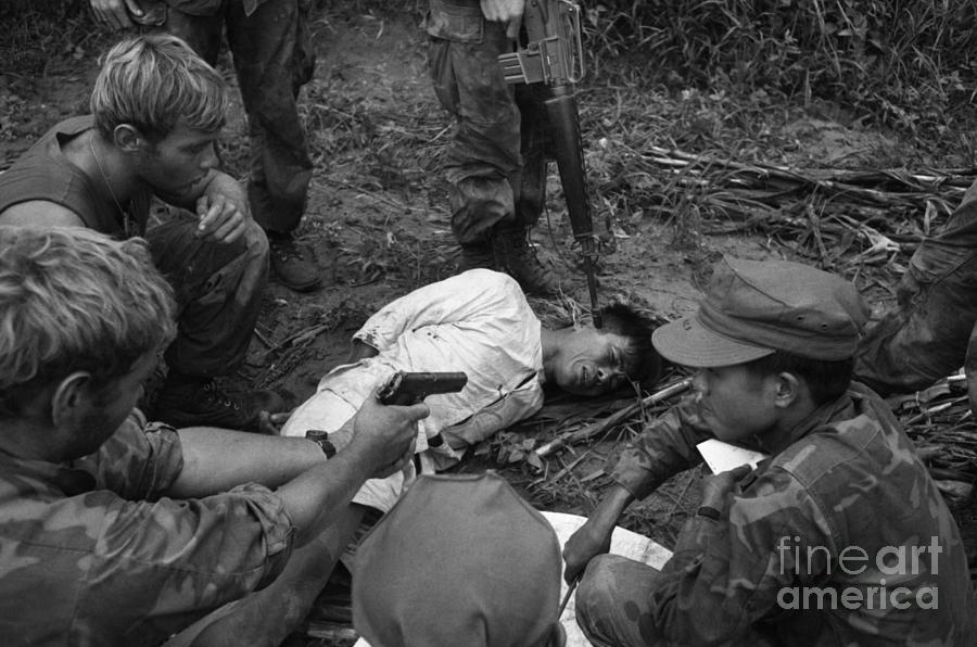 Rifle Photograph - Viet Cong Questioned At Gunpoint by Bettmann
