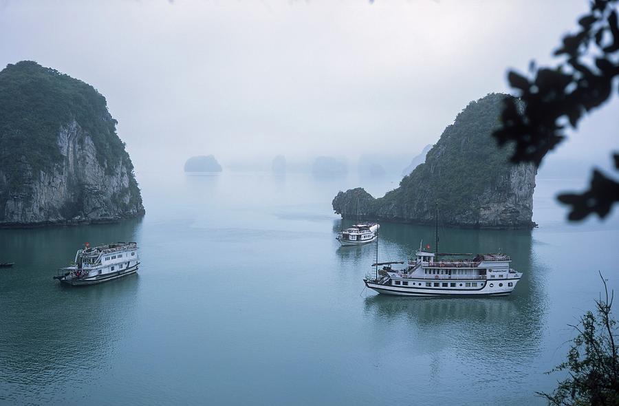 Vietnam, Northeast, Halong Bay, North Vietnam, Cruising Ships In The Misty Halongbay Digital Art by Roland Irek