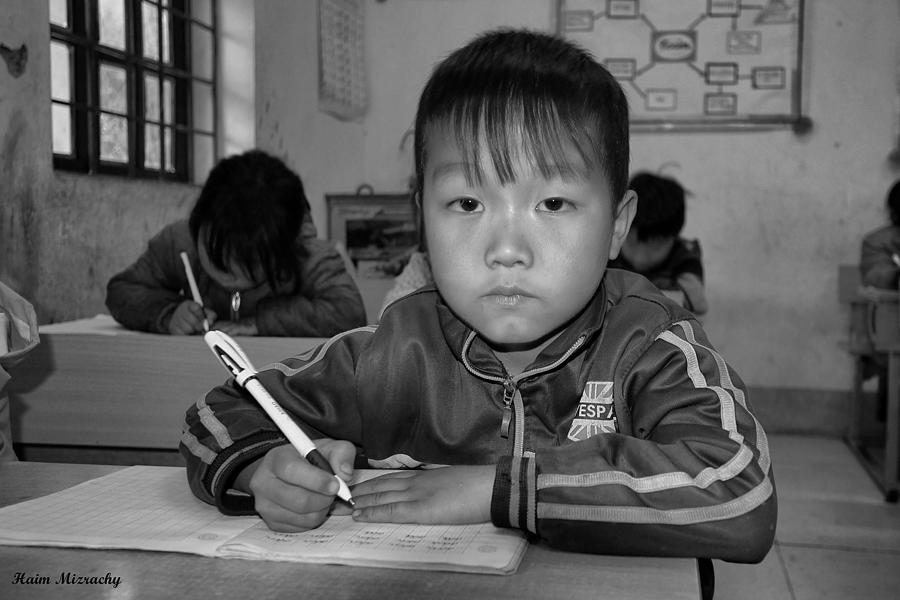 Vietnam Young Boy In The Classroom Photograph by Haim Mizrachy