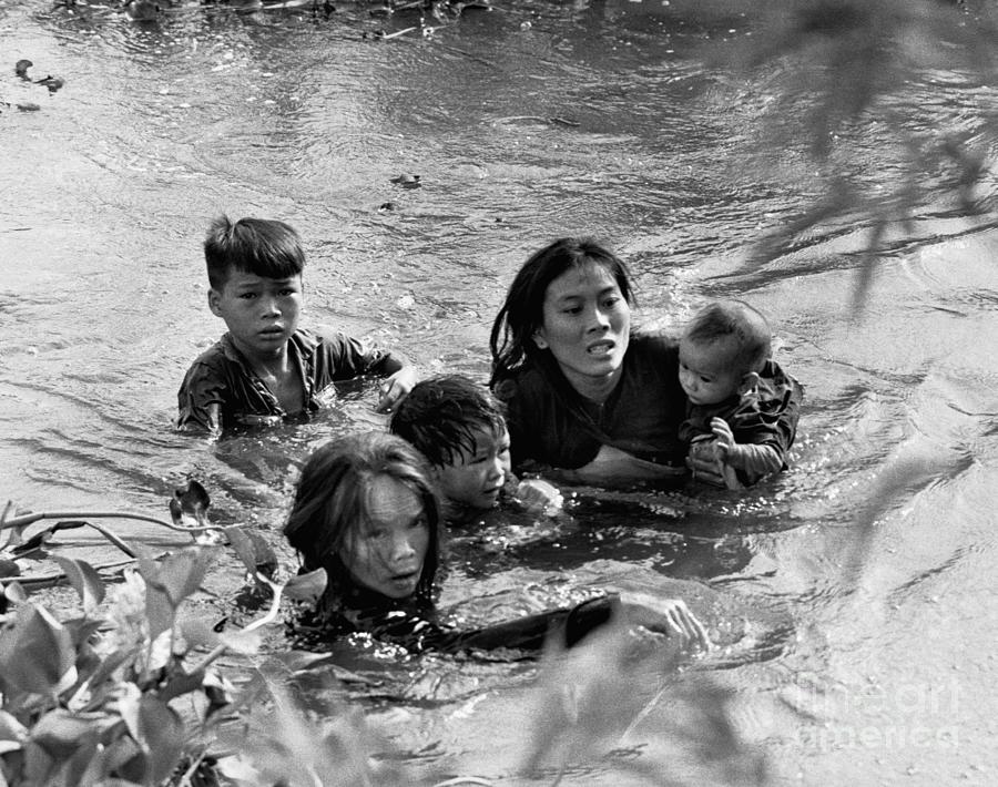 Vietnamese Mother And Children Flee Photograph by Bettmann