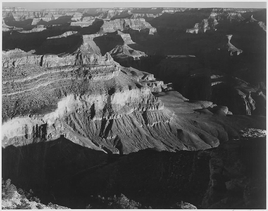 View dark shadows in foreground and right framing cliffs at left and center Grand Canyon National Park Arizona. 1933 - 1942 Painting by Ansel Adams