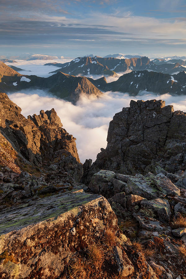 View From Top Of Skrasalen Above The Clouds To The Surrounding Peaks Of The Sunnmre Alps In The Evening Sun, Alesund, More Og Romsdal Fylke, Norway, Scandinavia Photograph by Tobias Richter