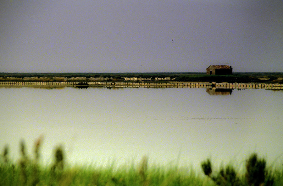 View Of A Saltpan With House On The Photograph by Marco Vacca
