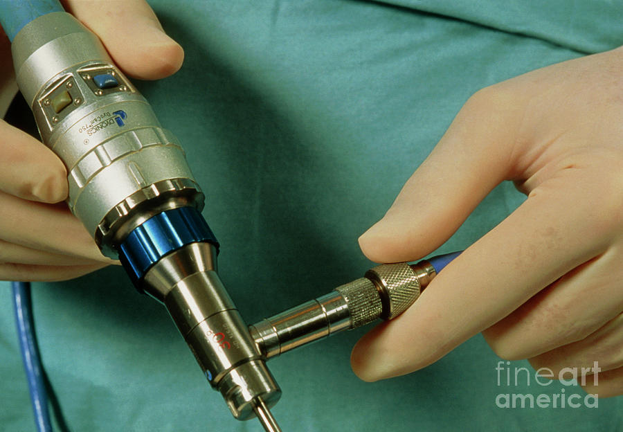 View Of An Arthroscope Held In A Surgeons Hands Photograph by John Greim/science Photo Library