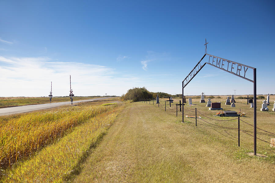 View Of Catholic Cemetery And Landscape On Highway 15, Saskatchewan, Canada Photograph by Jalag / Arthur F. Selbach