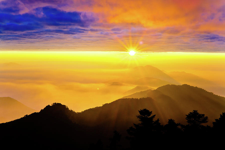 View Of  Mountains In The Fog At Sunset Photograph by Wan Ru Chen