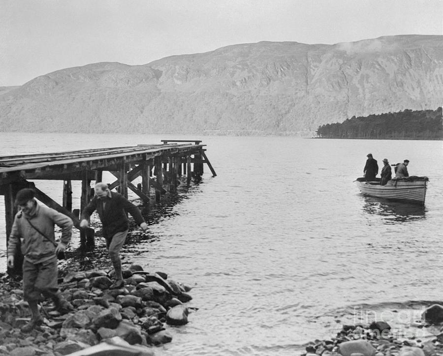 View Of Residents In Small Boat Photograph by Bettmann