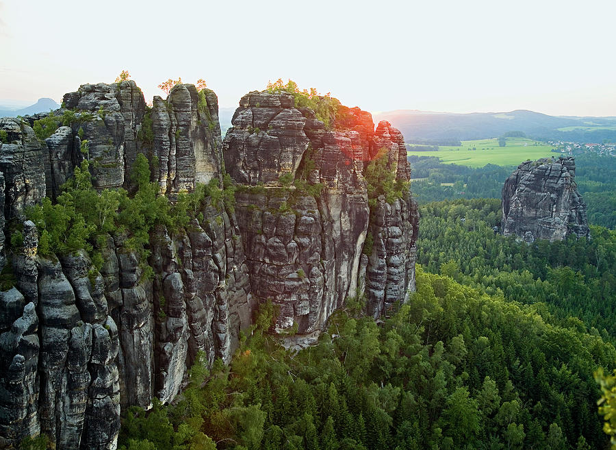 View Of Rocks And Forest At Dawn, Switzerland Photograph by Jalag / Walter Schmitz