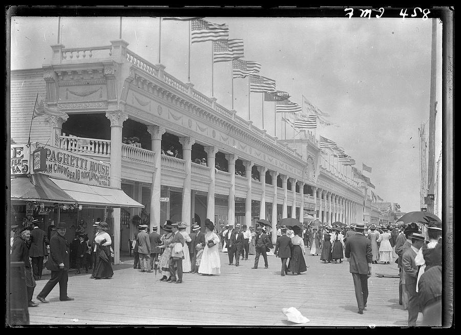 View Of The Boardwalk At Rockaway Beach Photograph by The New York Historical Society