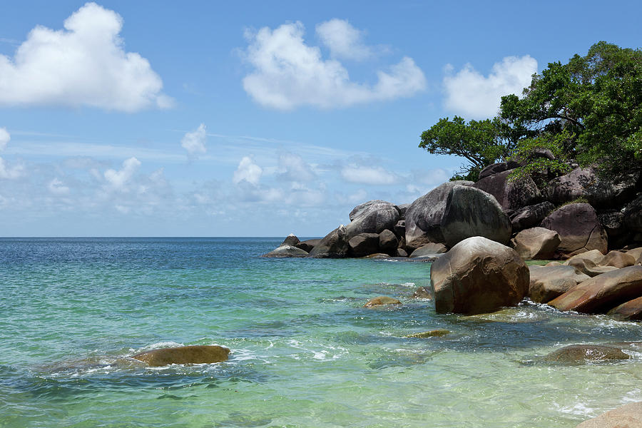 View Of The Sea And A Rocky Coastline Photograph by Caspar Benson