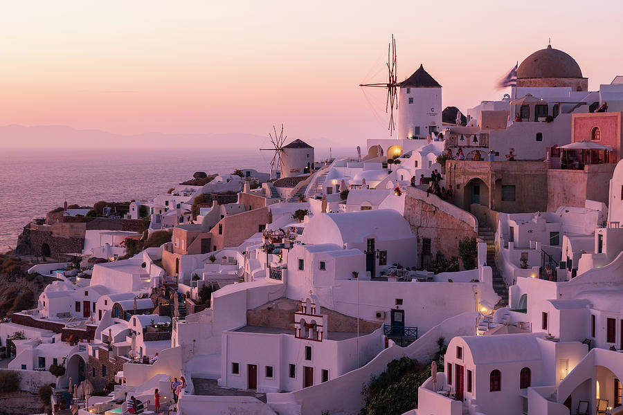 View Of The Windmills Of Oia, Santorini, Greece Photograph by Nicola Lederer