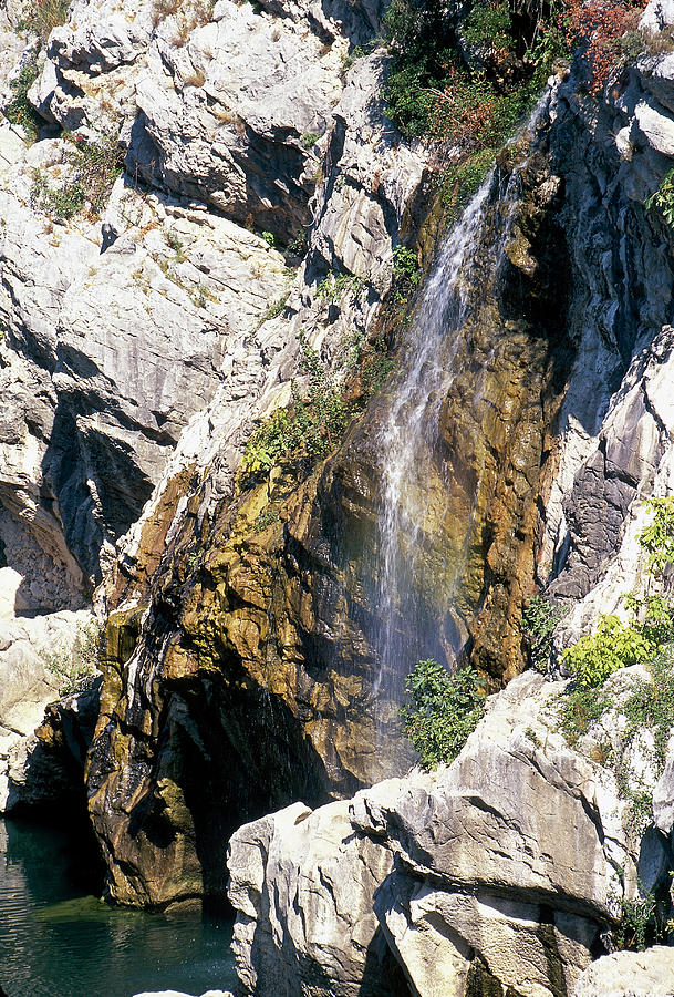 View Of Waterfall Through Rock In Languedoc, France Photograph by Jalag / Gnter Beer