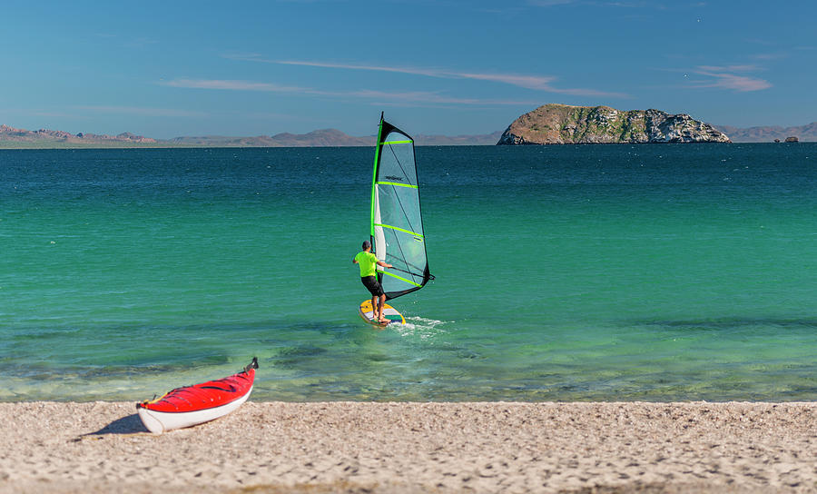 View Of Wind Surfer And Kayak On Beach Photograph by Panoramic Images
