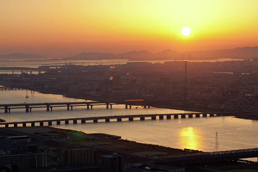 View Of Yodogawa River With Setting Sun Photograph by Alexey Kopytko