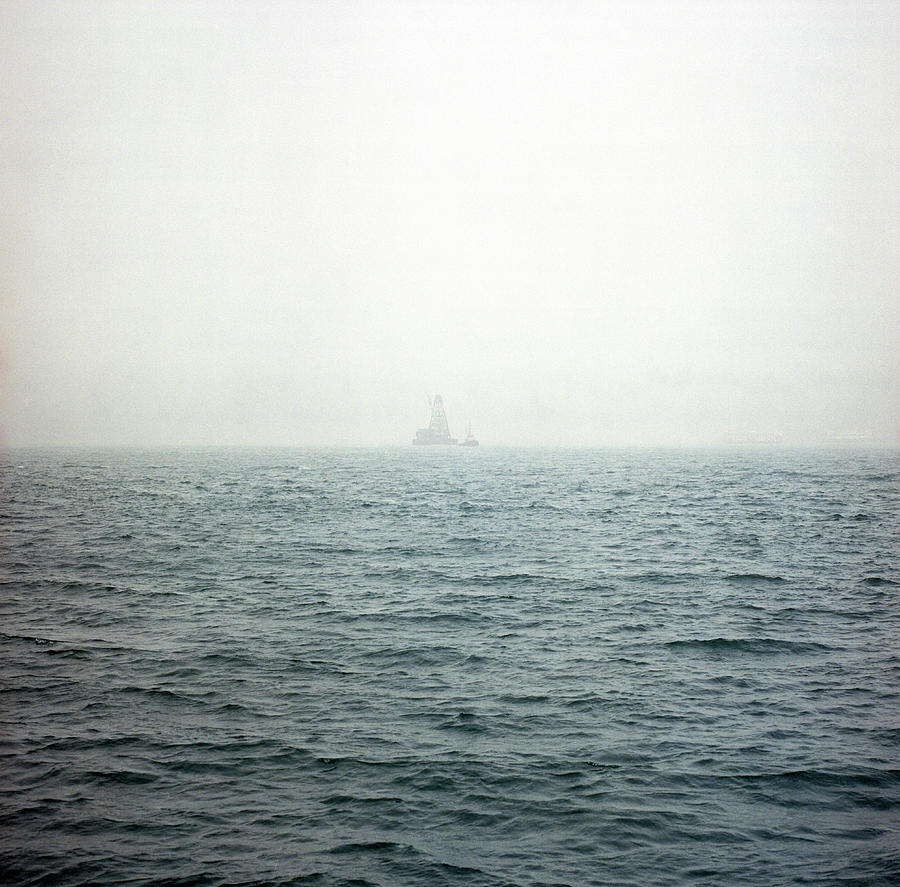 View Toward A Vessel At Harbour On A Photograph by Kevin Liu