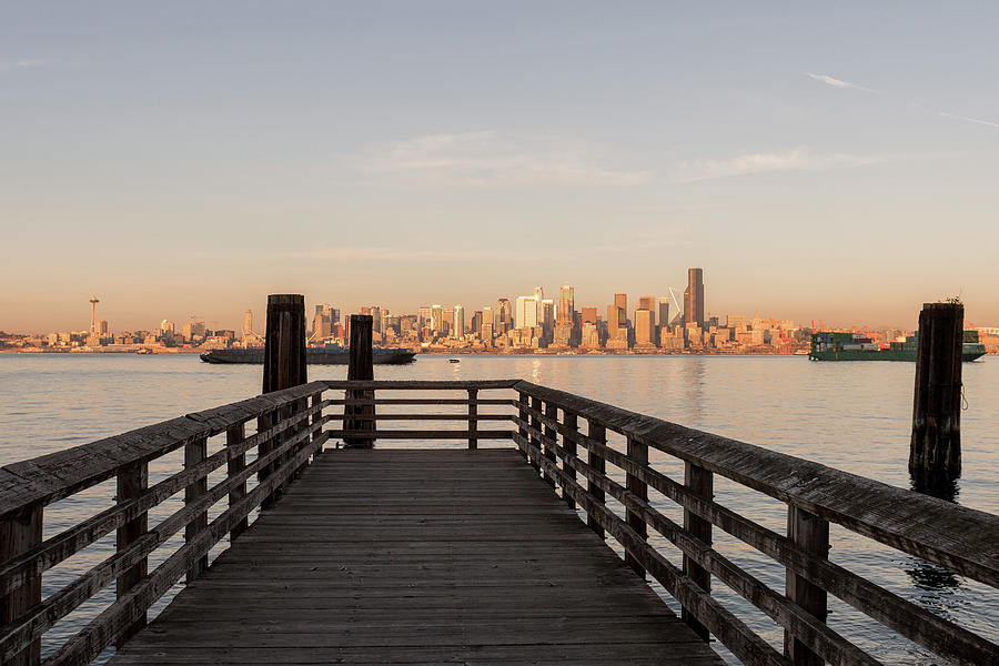 Views Of A Jetty In Elliott Bay, Seattle Bay, With Sunset Light Over Downtown Skyscrapers In The Bac Photograph