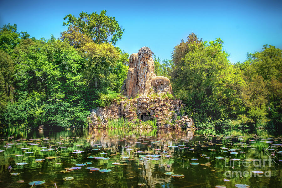Villa Demidoff Pratolino park and the Colosso del Appennino colossus statue with pond full of waterlilies and leaves Photograph by Luca Lorenzelli