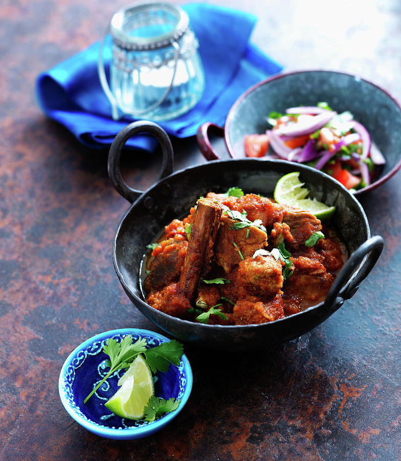 Vindaloo Curry With Lime And Coriander Leaves india Photograph by Karen Thomas