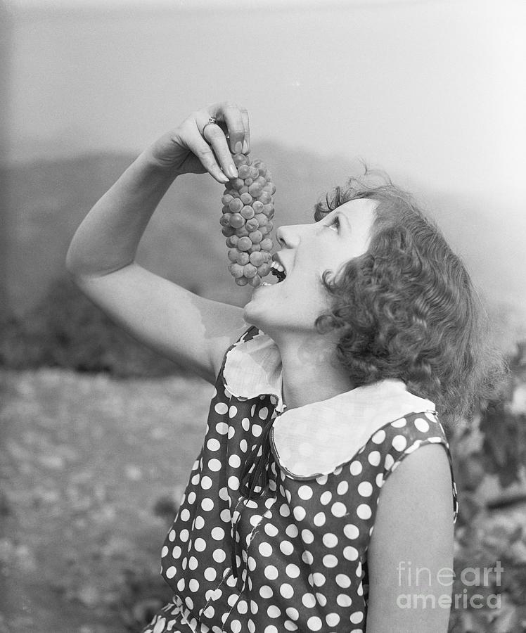Vineyard Festival Participant Eating Photograph by Bettmann