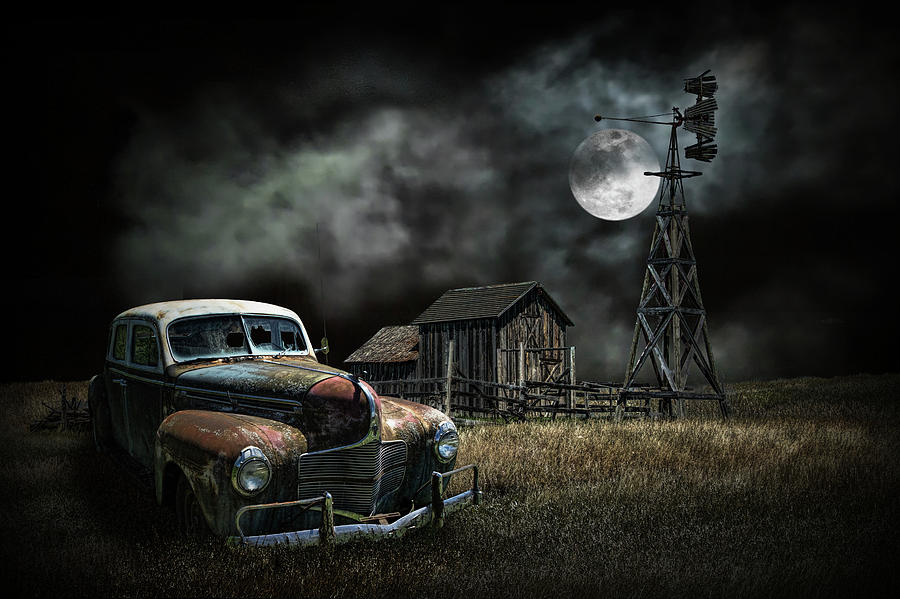 Vintage Automobile and Wooden Barn with Windmill by Moon Light Photograph by Randall Nyhof