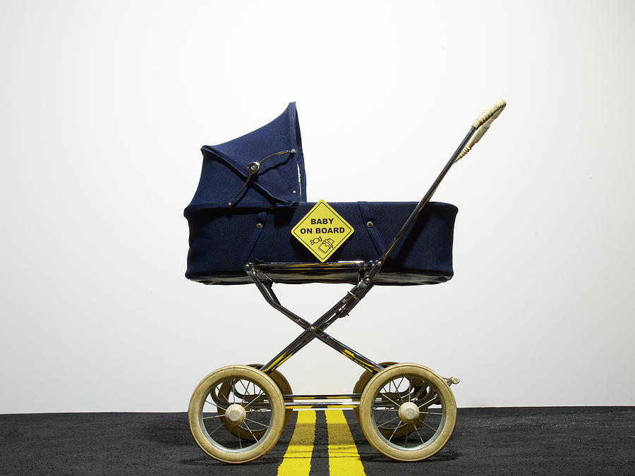 Vintage Baby Carriage With Sign Photograph by Bill Diodato
