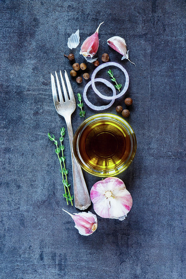 Vintage Background With Cooking Ingredients olive Oil, Onion, Garlic On Dark Metal Texture Photograph by Yuliya Gontar