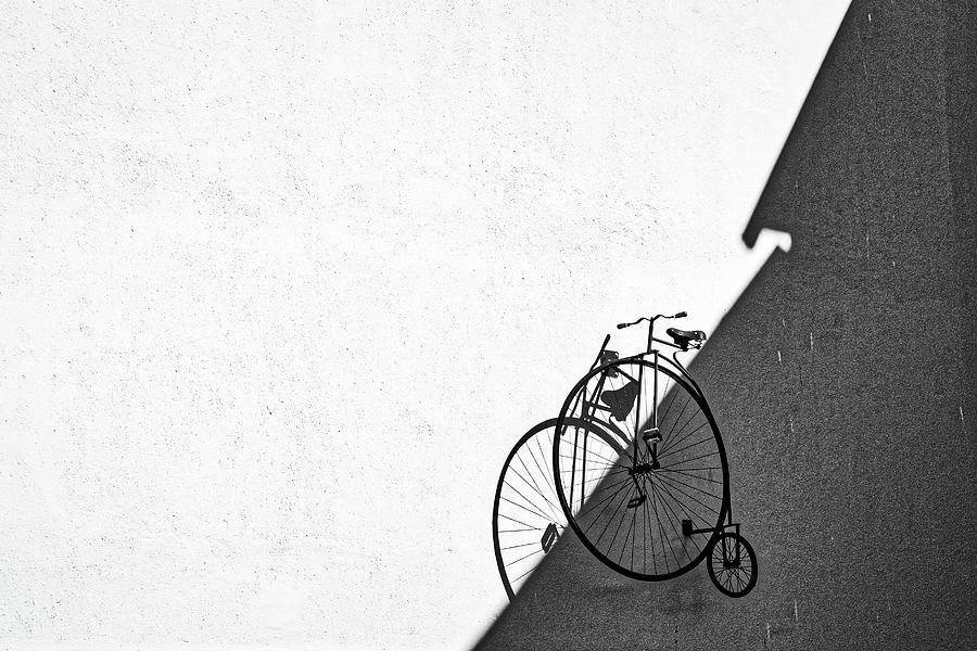 Vintage Bicycle on a Wall Photograph by Stuart Litoff