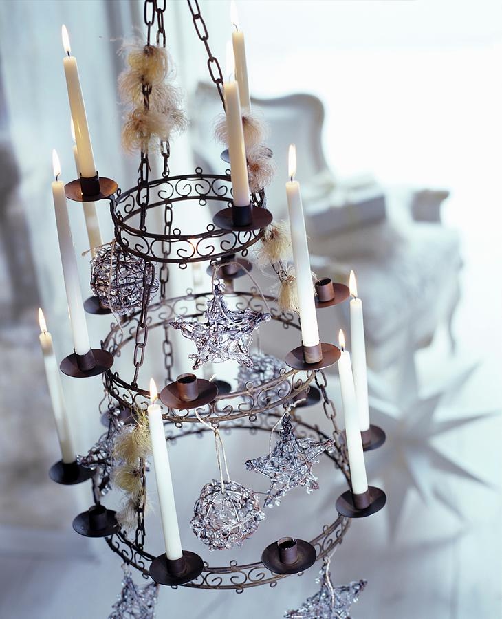 Vintage Candle Chandelier Decorated With Christmas Tree Baubles And Lit Candles Photograph by Matteo Manduzio