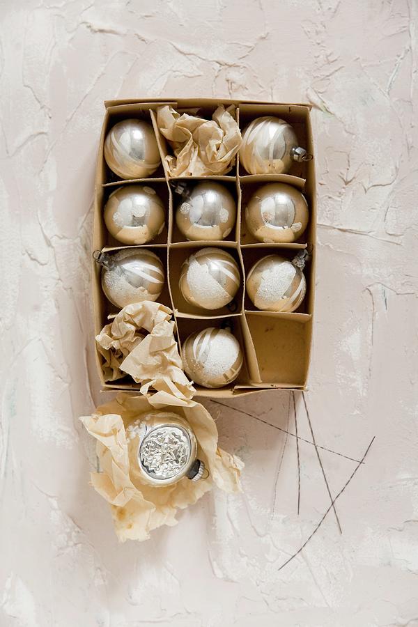 Vintage Christmas-tree Baubles In Old Carboard Box Photograph by Alicja Koll