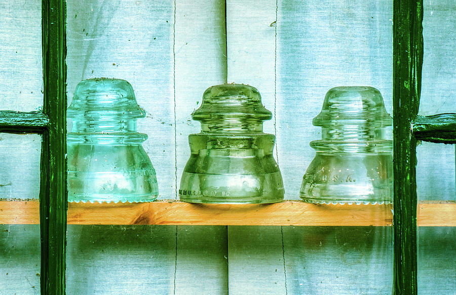 Vintage Glass Electrical Insulators In Window Photograph by Gary Slawsky