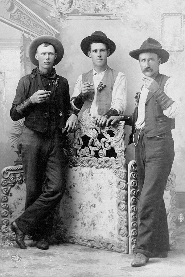 Vintage Image Of Cowboys Drinking And Photograph by Thinkstock Images